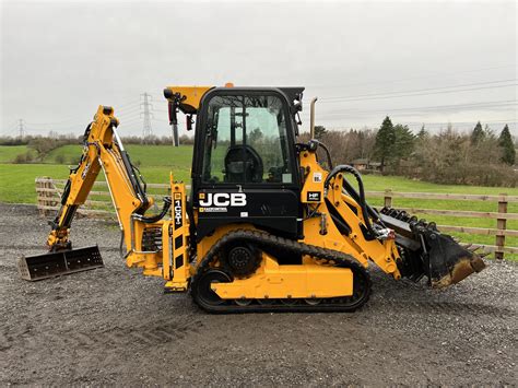 jcb skid steer back hoe|jcb 1cxt price.